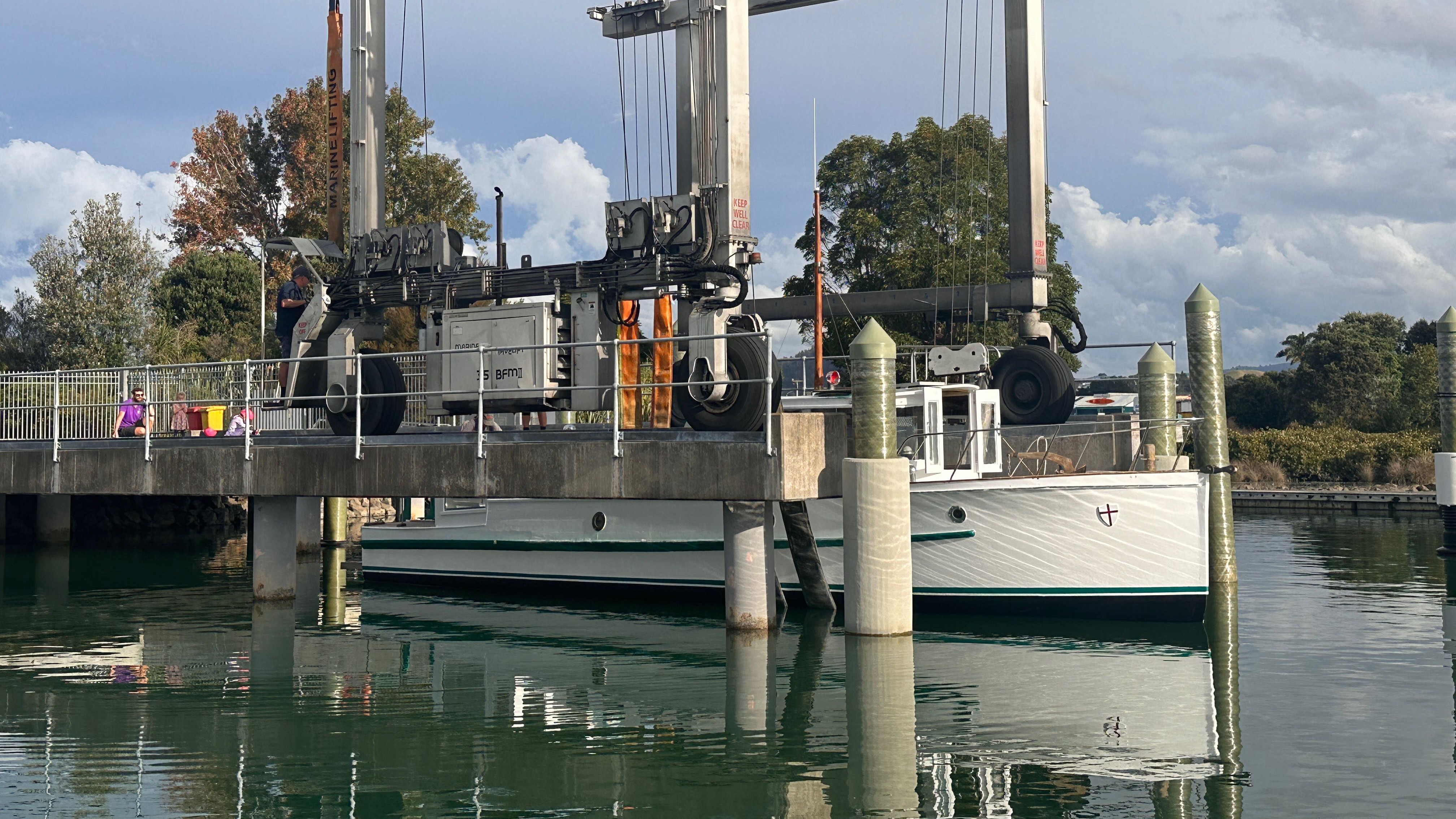 Boat in the harbour getting ready for a haul out