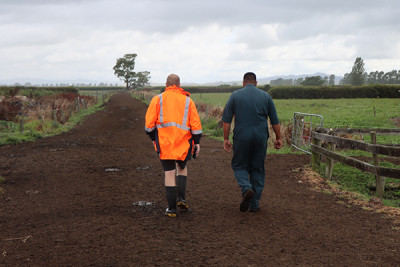 Joe and a farmer during an inspection of a farms’ effluent system