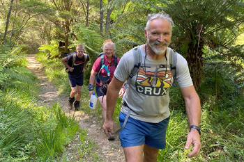 Volunteers tramp in to check traps