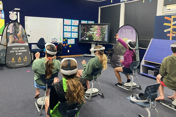 Students experiencing the Kauri VR headset